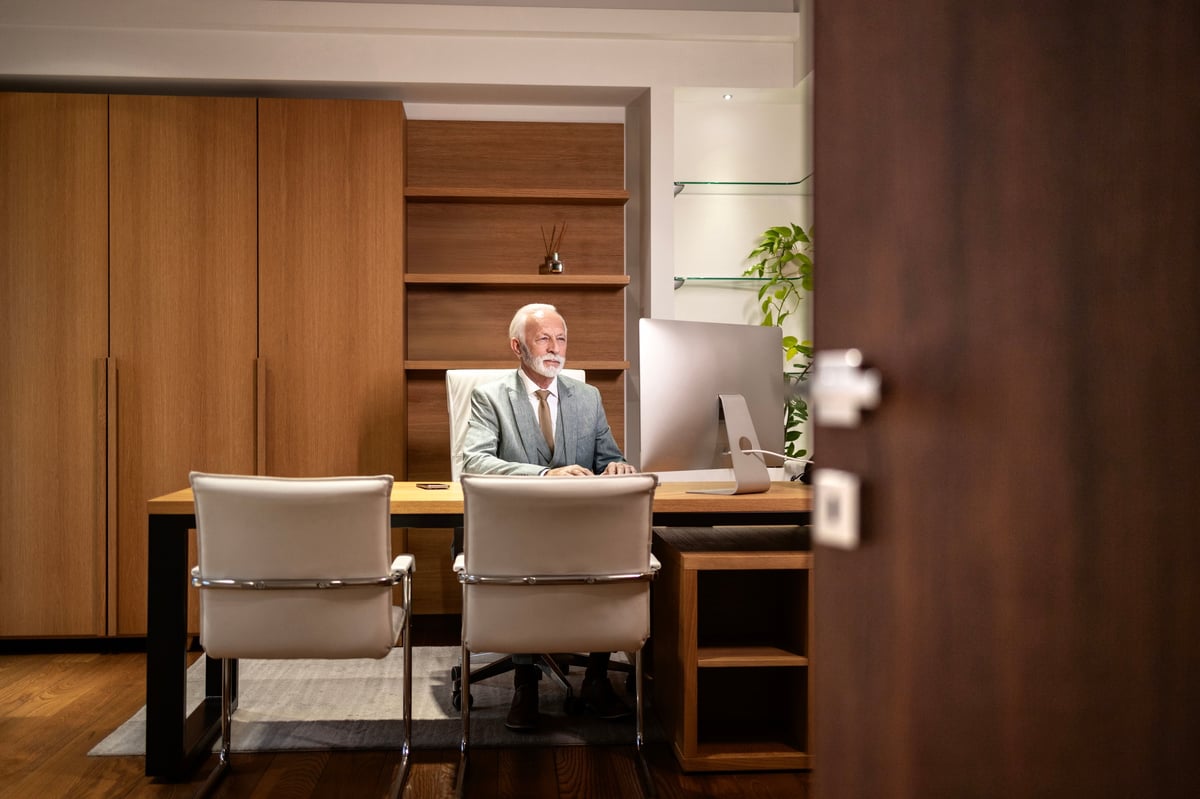 Senior executive working in a refined private office