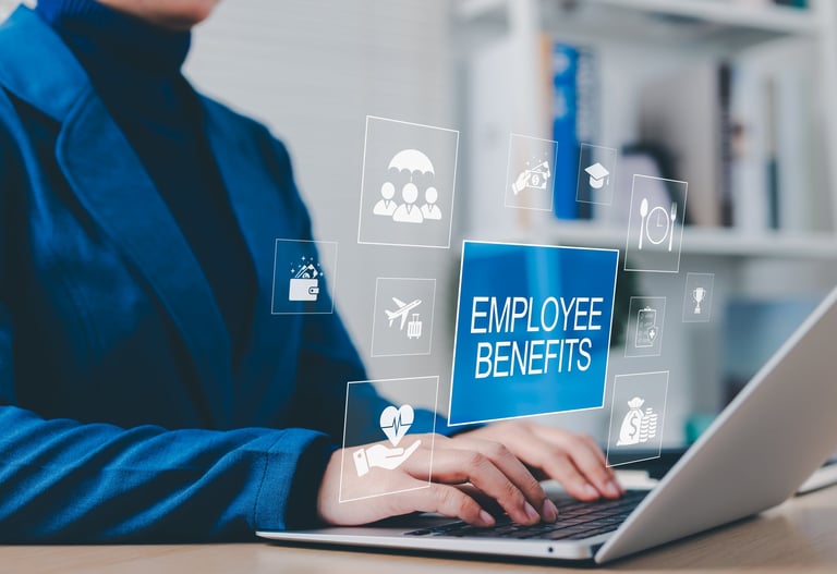Employee Benefits and Compensation Strategy Concept. Businesswoman typing on laptop with icons showcasing employee benefits