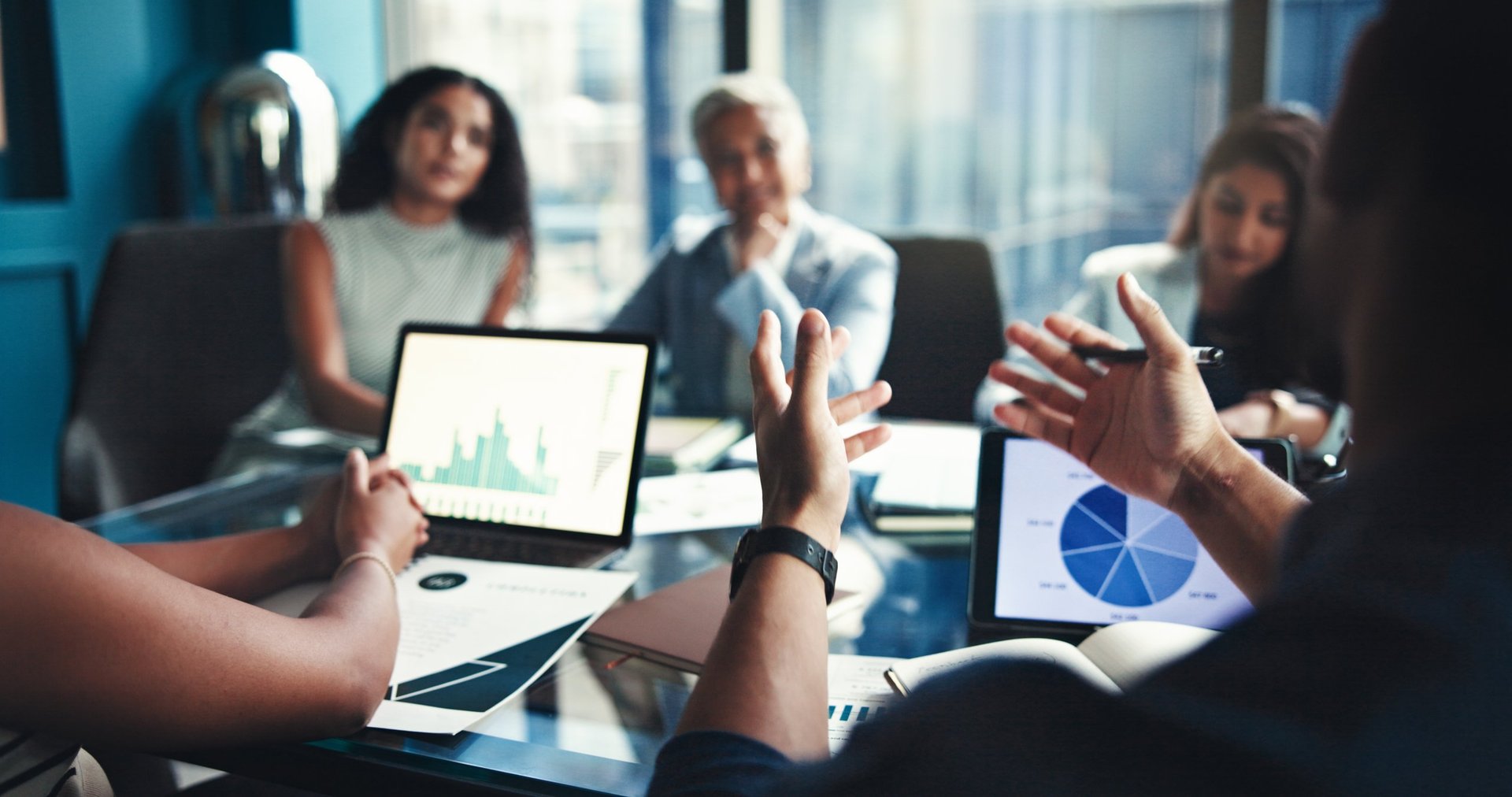Business professionals negotiating vendor contracts in a modern office