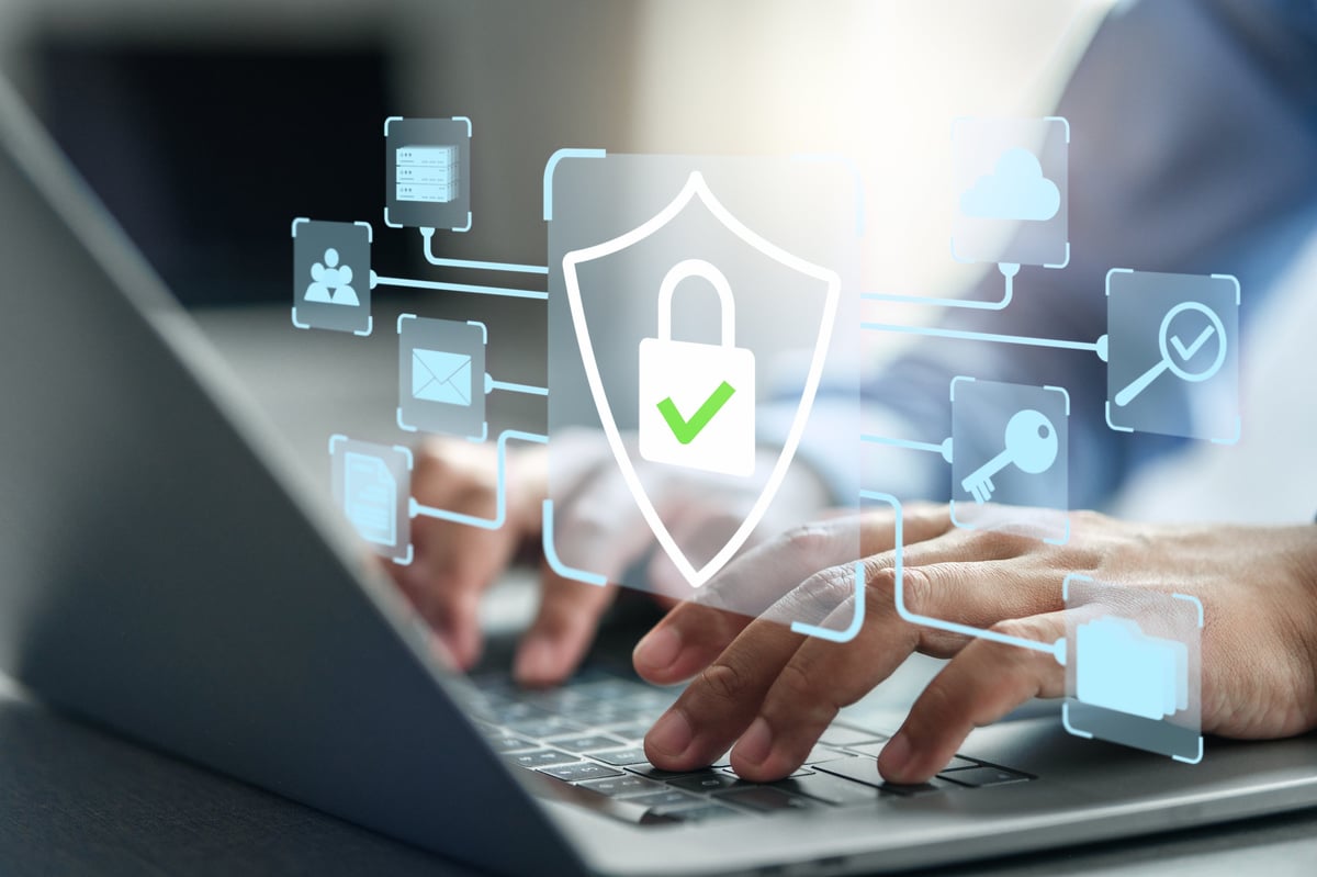 Internet Security. Secure Global Data Connection. A Man Uses Computer with Security System and Encrypted Data.