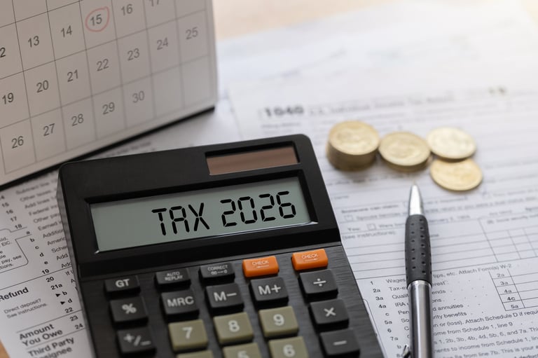 Annual tax planning with calculator and financial documents for cost segregation analysis