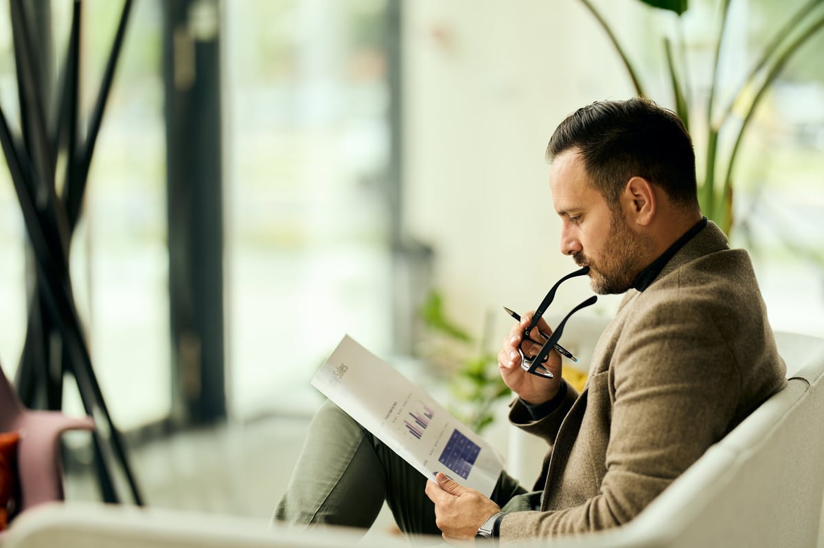 CFO reviewing cash flow and working-capital performance reports