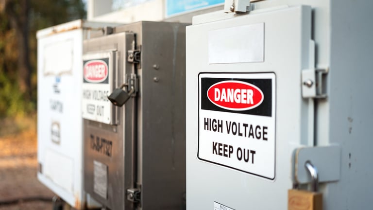An electricity junction box and circuit panel with danger high voltage sign
