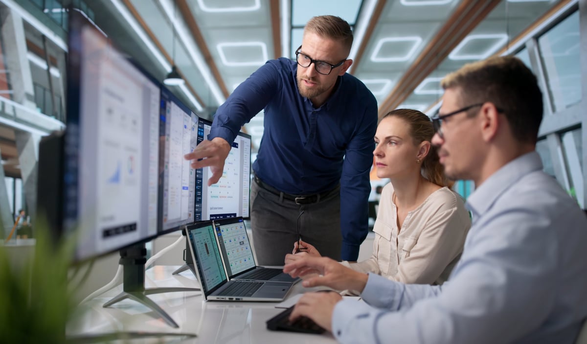 Finance and IT leaders coordinating software subscription management and application inventory across departments