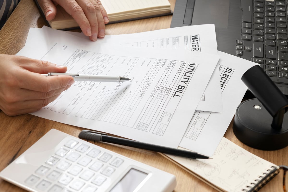 Finance team identifying overpayments hidden in vendor invoices and utility bills