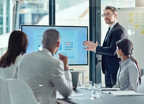 Senior advisor and business owner reviewing vendor savings categories and contract analysis